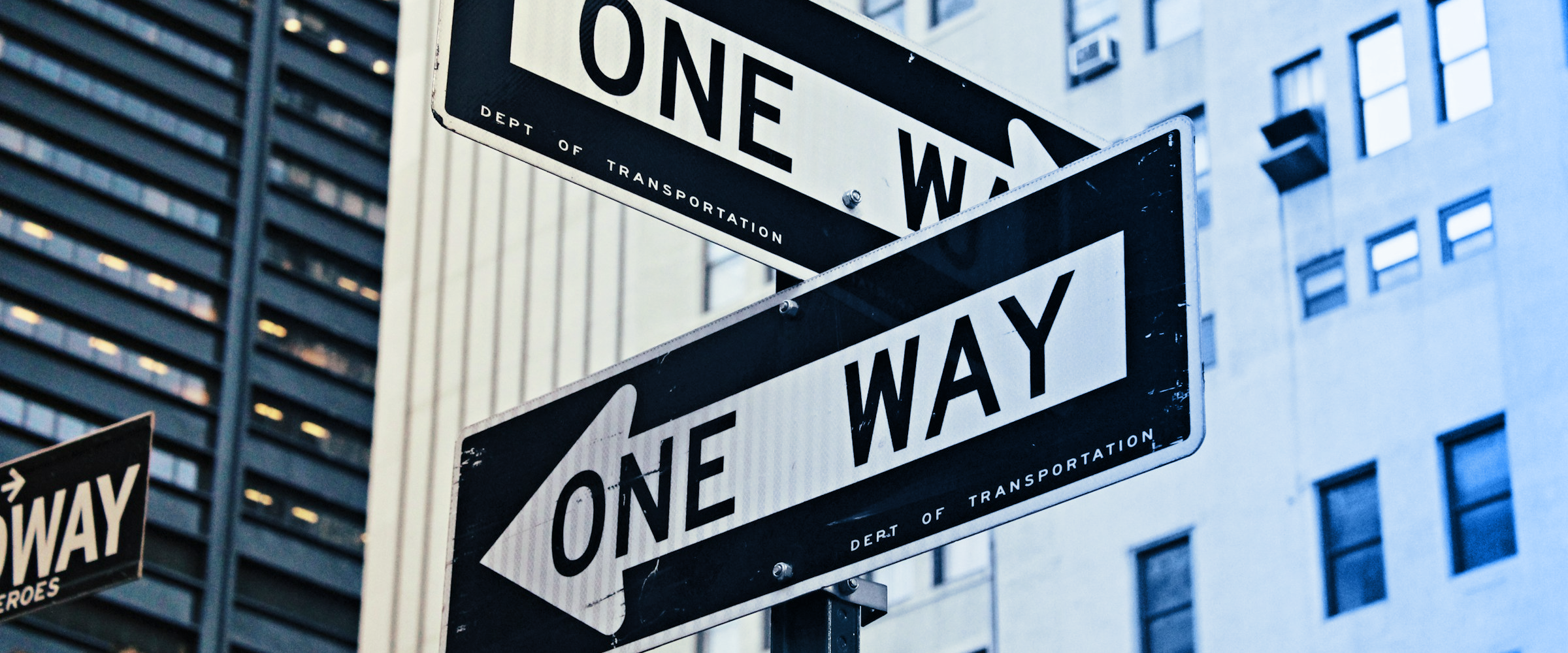 One way street signs symbolizing different programming language paths in web development