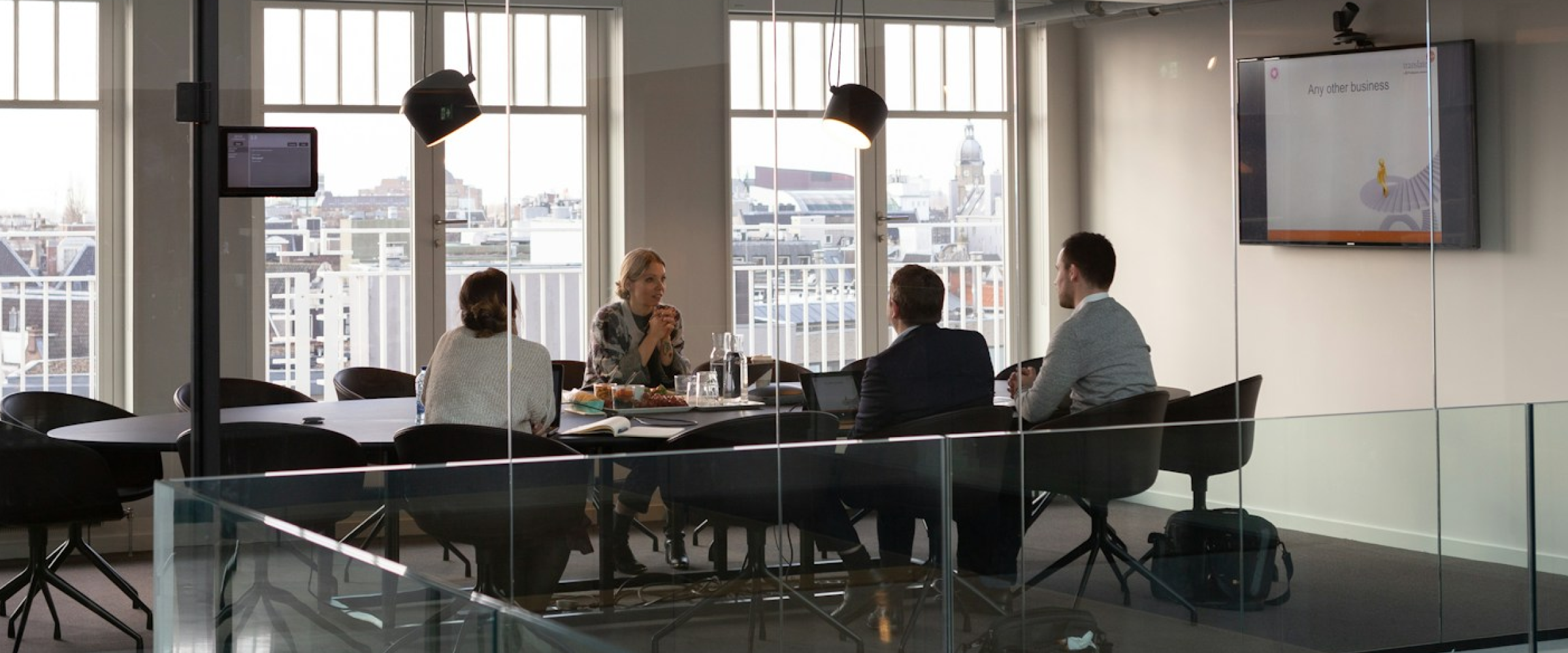 Web development company team working in a modern open office workspace