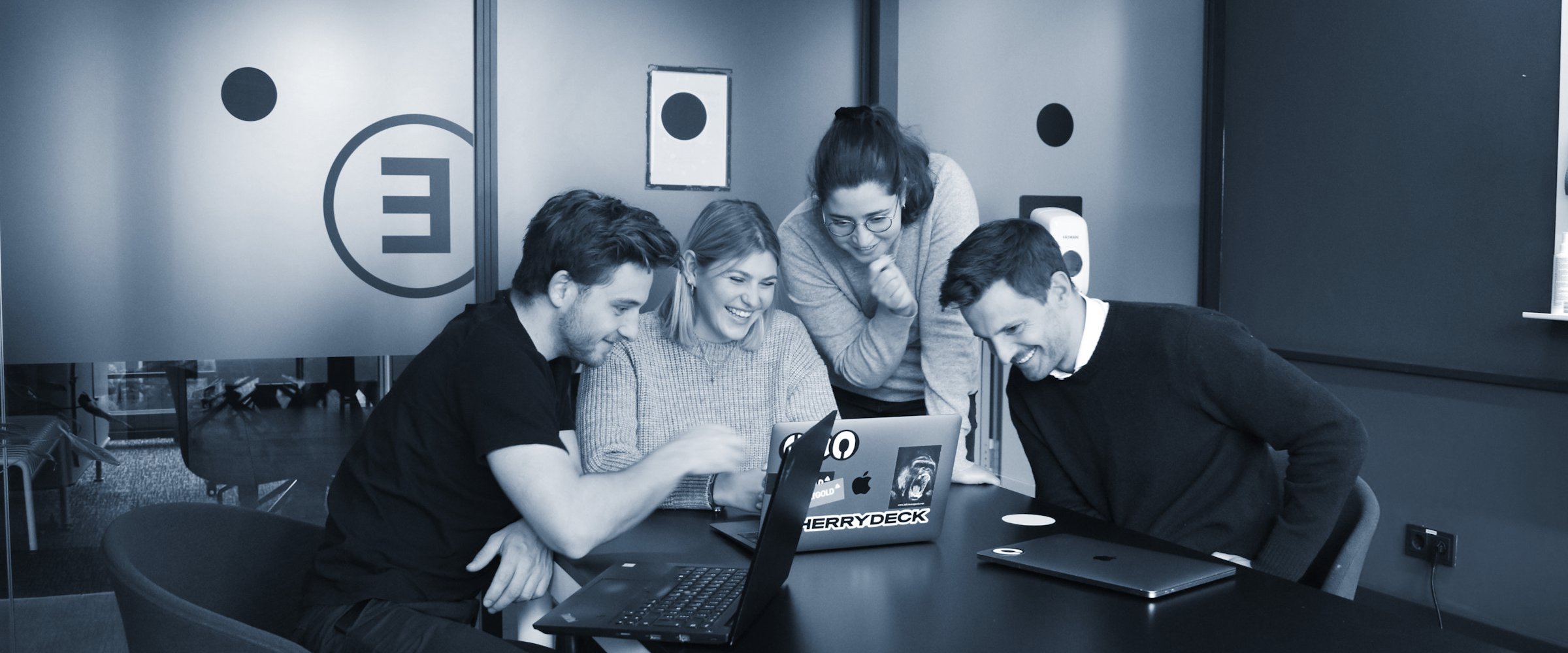Agency team and client working together on digital projects, demonstrating a successful long-term web development partnership.