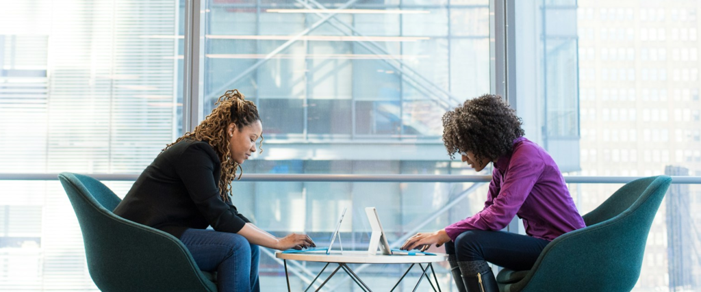 Business professionals discussing website requirements before hiring a web development agency